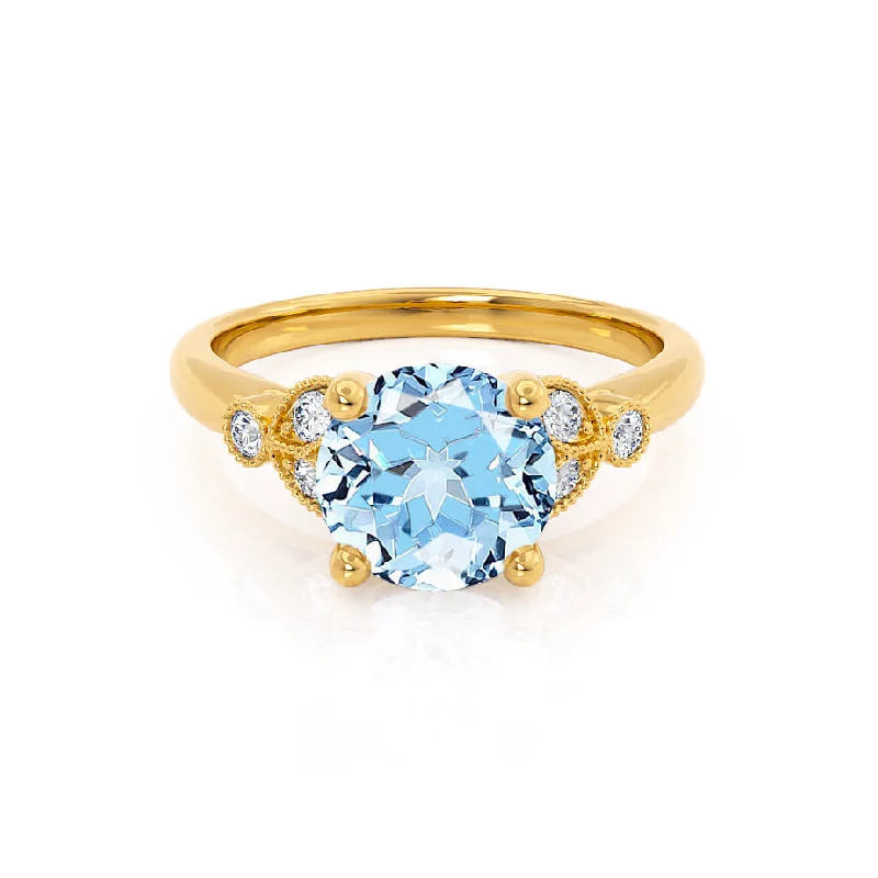 DELILAH - Chatham® Round Aqua Spinel 18k Yellow Gold Shoulder Set Ring