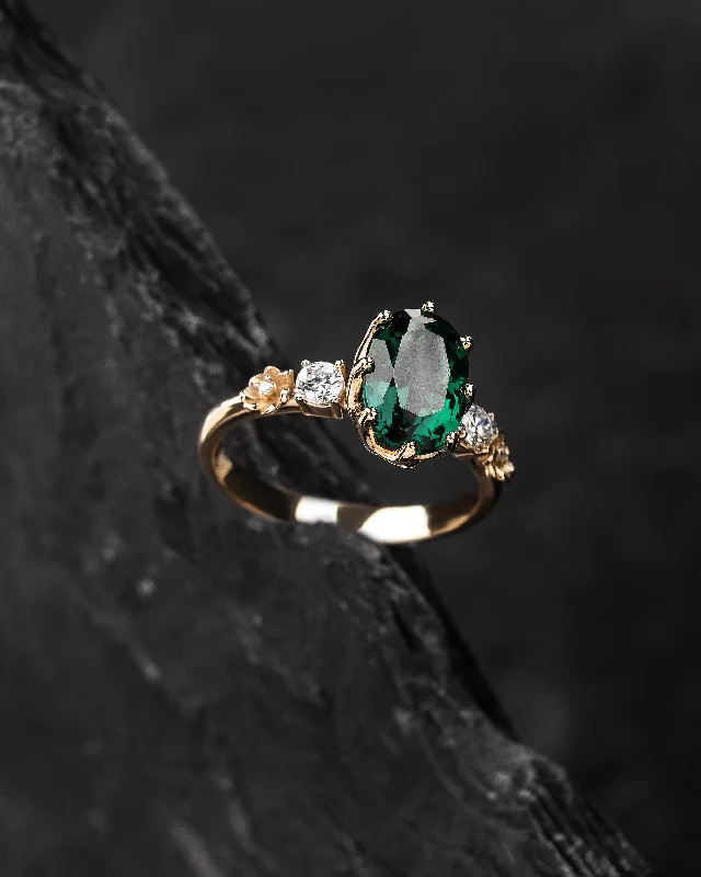 Gorgeous lab emerald engagement ring on a floral diamond band / Fiorella