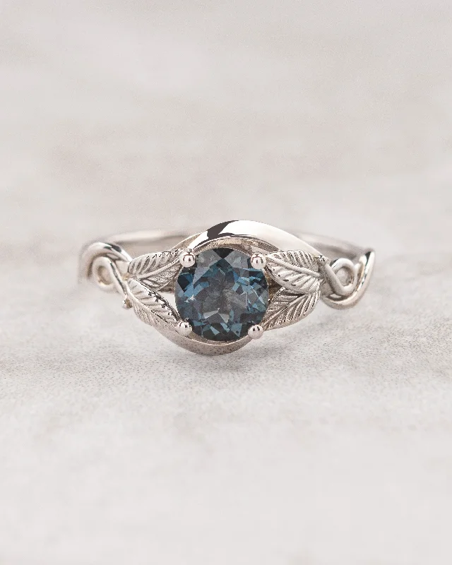 Nature inspired engagement ring with leaves and London blue topaz / Azalea