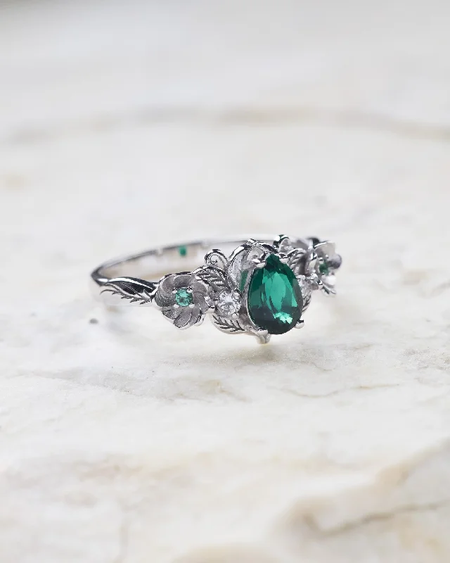 Lab emerald engagement ring with lovely flowers and diamonds / Adelina