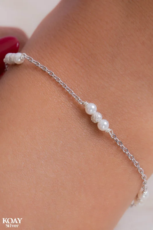 diamond bangles for women-Balls And Small Pearls Bracelet