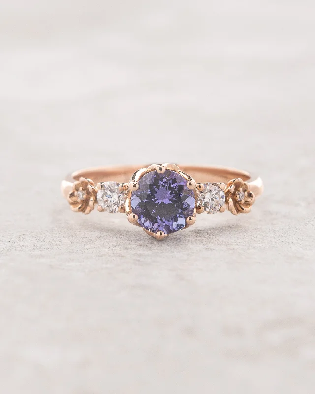 Magical tanzanite engagement ring with diamonds and tiny flowers / Fiorella