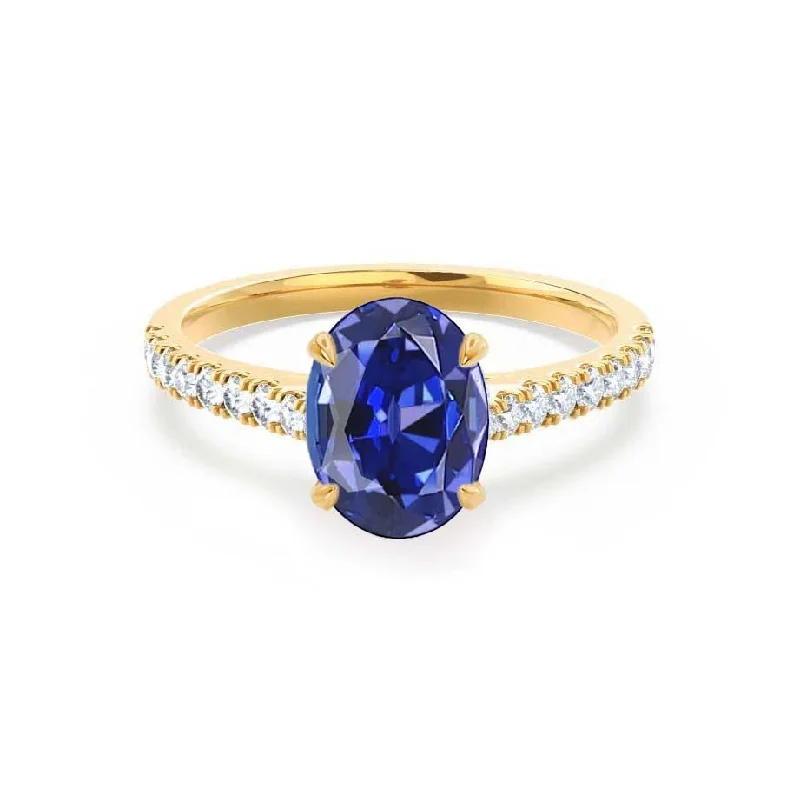 VIOLA - Chatham® Blue Sapphire Oval  & Diamond 18k Yellow Gold Shoulder Set Ring